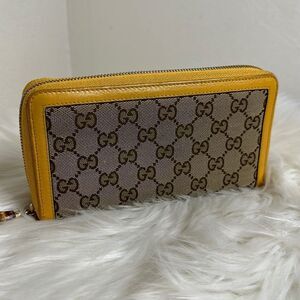 Gucci GG Canvas Bamboo Tassel Zip Around Long Wallet Yellow